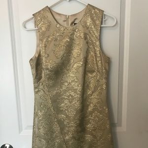Beautiful gold short ABS dress size 4
